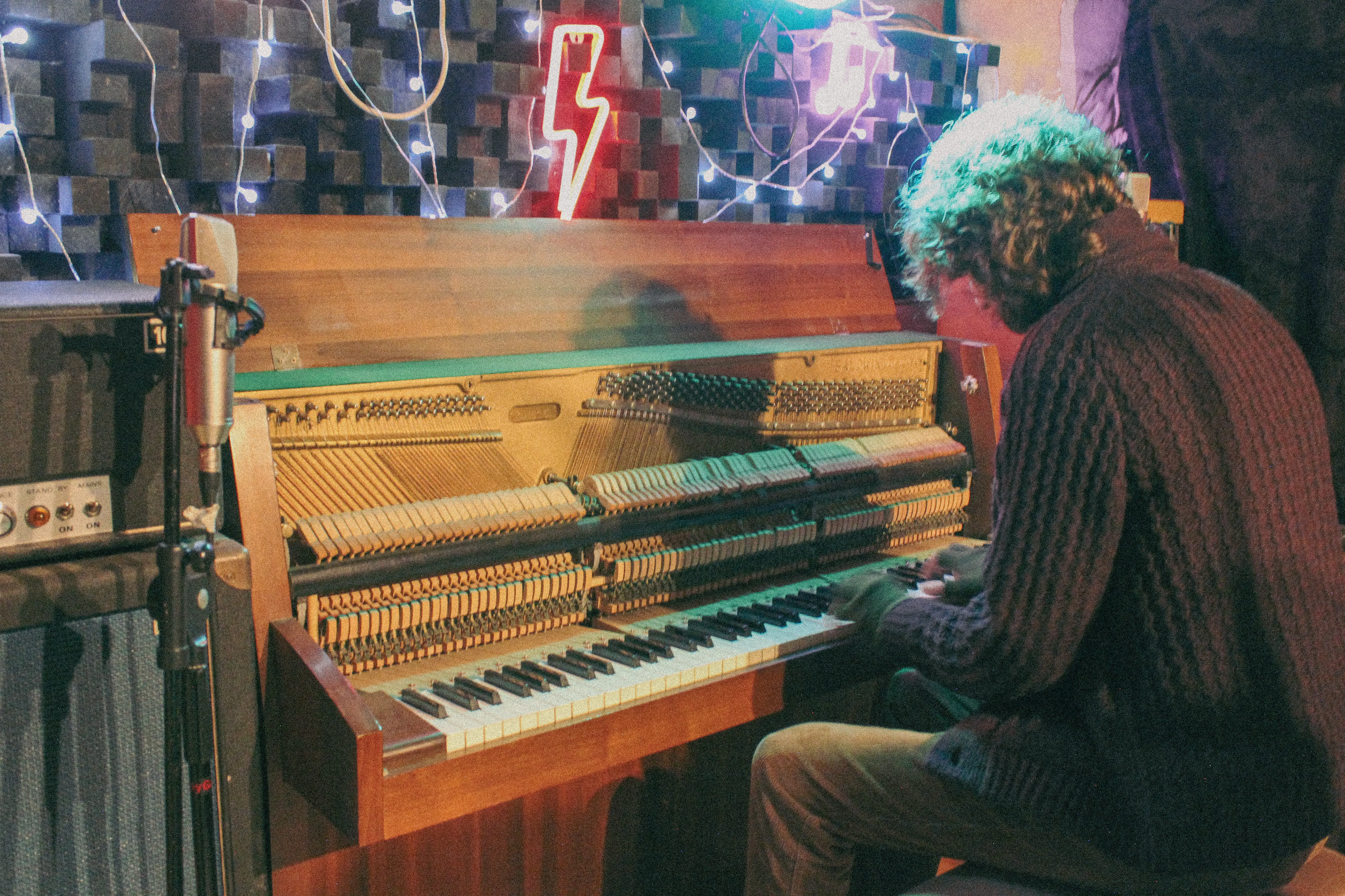 Man sat at piano